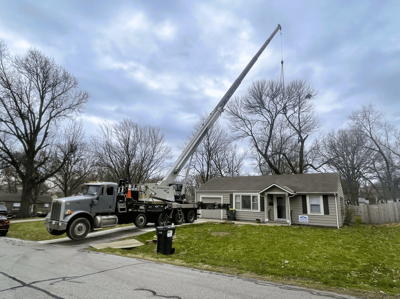 Reaching New Heights: The Advantages of Crane Services in Tree Removal