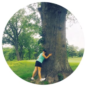 Owner Cheryl Cartwright Hugging a tree!